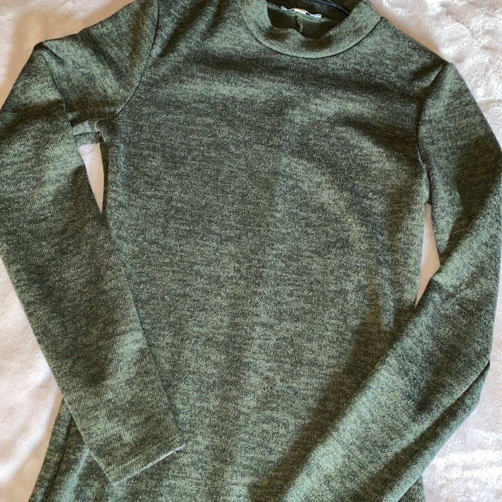 Long sleeve green dress.